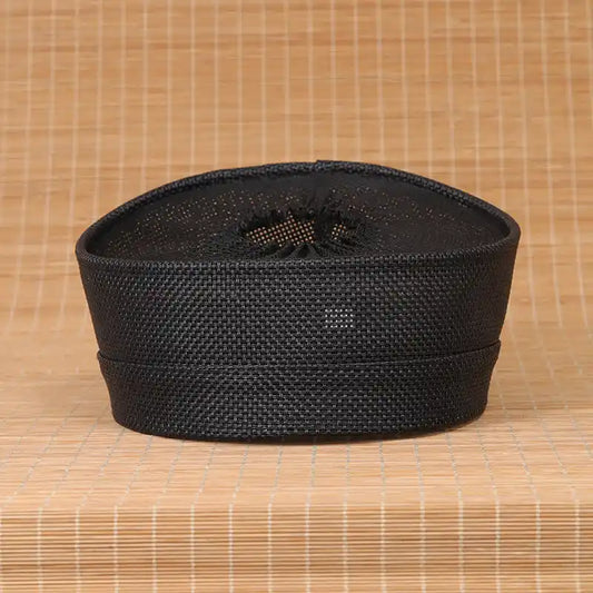 玄冠 Xuanguan — Taoist black ceremonial crown worn by Zhengyi rank priests