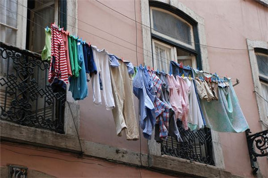 Omen - Woman Dreaming of Collecting Dried Clothes
