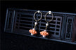 Omen - Woman Dreaming of Many Beautiful Earrings