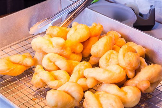 Omen - Woman Dreams of Fried Dough Sticks?