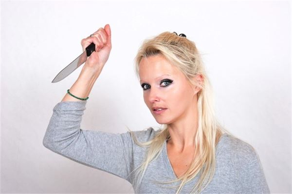 The Omen of a Woman Dreaming of Knife Cutting People