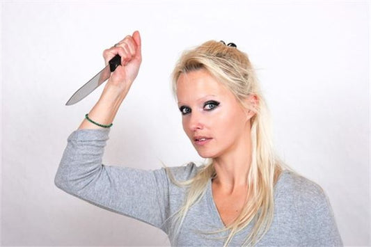 The Omen of a Woman Dreaming of Knife Cutting People