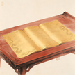 Three golden Taoist ordination documents displayed on ceremonial table