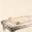 Ancient bamboo slips and scrolls on a stone desk, representing Xiangshu studies