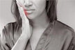 Woman Dreaming of Two Teeth Falling Out with Blood: Five Elements Water (水), mixed omen. Auspicious in winter, inauspici
