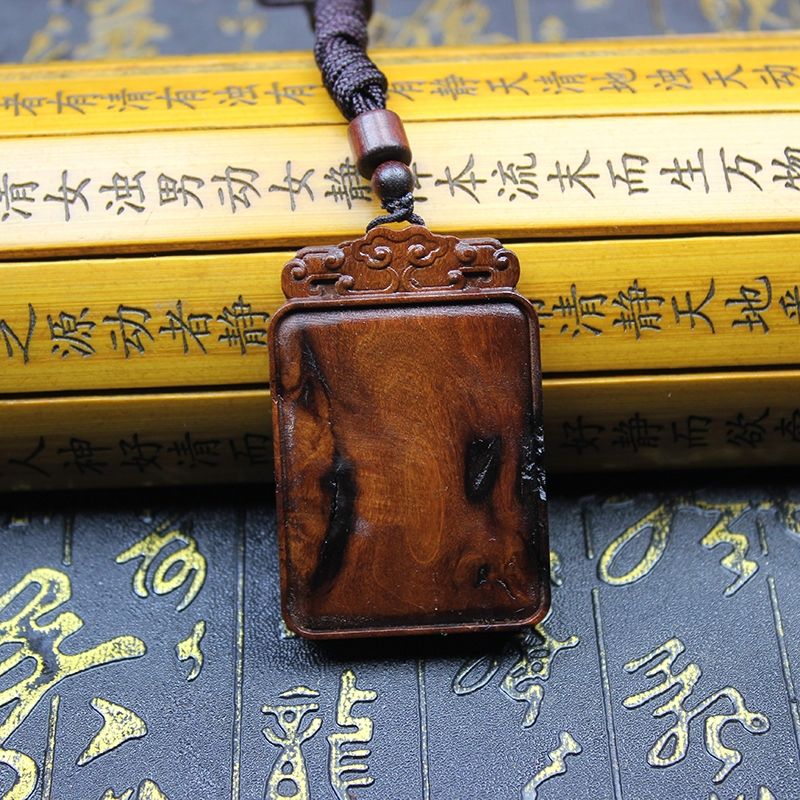 Daoist Thunderstruck Jujube Wood Peace Talisman Plaque showcasing its intricate design and rich texture.