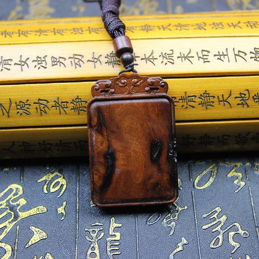 Daoist Thunderstruck Jujube Wood Peace Talisman Plaque showcasing its intricate design and rich texture.