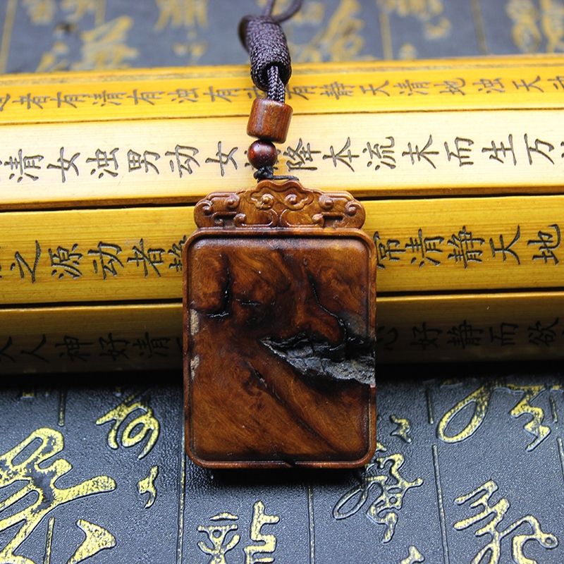 Daoist Thunderstruck Jujube Wood Peace Talisman Plaque featuring intricate carvings and natural wood texture.